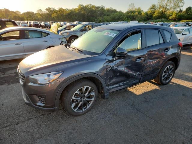  Salvage Mazda Cx